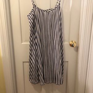 Blue and white striped and pleated sundress.